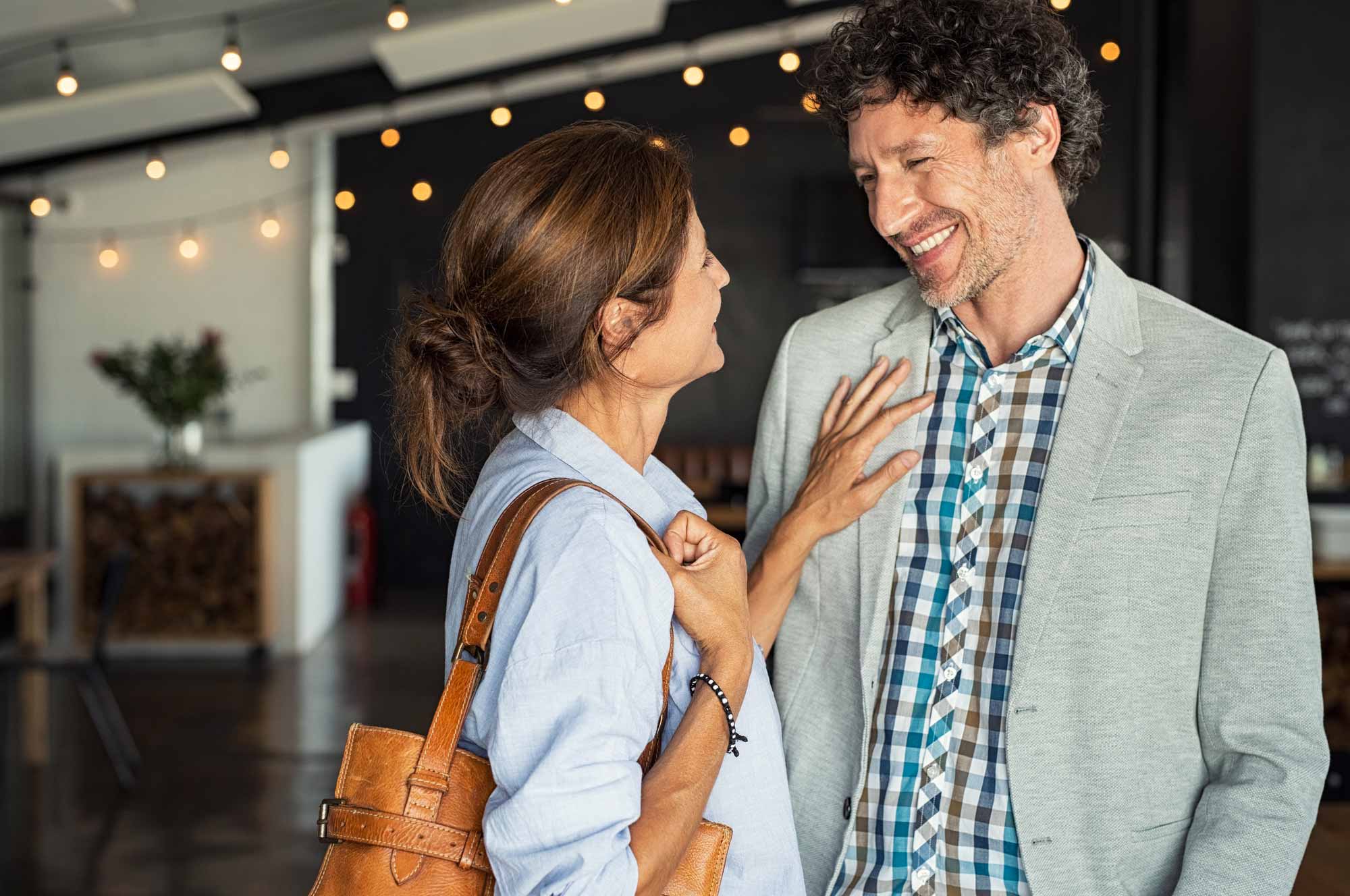 A mature couple meeting face-to-face.